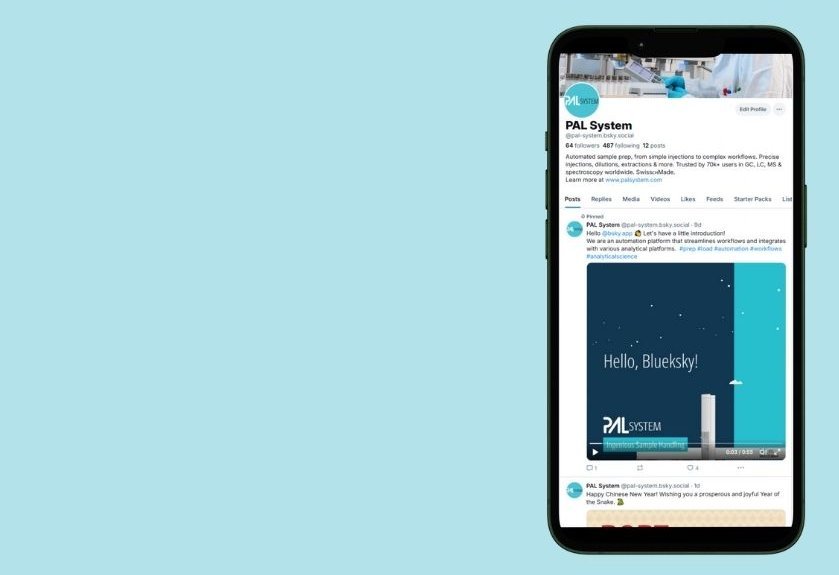 A close up of a smartphone displaying the overview page of PAL System on Bluesky